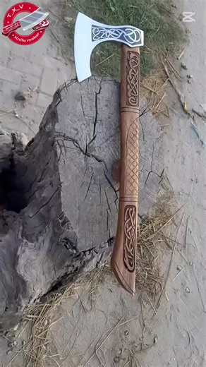 🪓 Handcrafted Viking-Style Axe – TXV Knife Maker 🔥 Custom Made | Fully Functional | Decorative & Collectible Crafted with precision and passion, this Viking-style axe features: ✅ High Carbon Steel Blade with engraved Nordic patterns ✅ Solid Wood Handle with deep Celtic carvings ✅ Perfect Balance for display, gifting, or light use 📏 Size: Handle Length: 18 inches Blade Width: 6 inches 🎁 Ideal for: Collectors Viking fans Outdoor enthusiasts Unique gifts for birthdays or holidays 🖐 Every piece