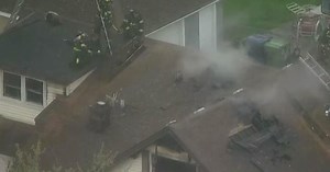 Firefighters battle house fire in Oak Lawn