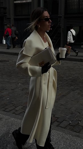 MONDE MACKAGE @hannahlewisstylist wears MAI, MACKAGE’s timeless long wrap coat handmade from luxurious soft double-face wool. The fluid drape provides a relaxed-fit and unlined layer for maximum comfort in mild climates. The waterfall collar adds a sophisticated appeal while leather welting highlights the waist pockets and belt loops. More on MACKAGE.COM #MACKAGE #MONDEMACKAGE