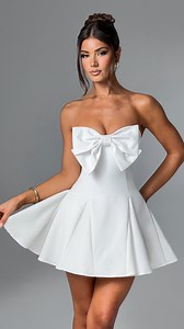 RUBY, made for romance 🕊️ An effortlessly chic playsuit, featuring a flattering strapless neckline highlighted by an artful bow. A design bound to turn heads. Shop now exclusively at Babyboofashion.com | Babyboo Fashion