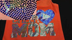 8.9K views · 53 reactions | Forget about Rhinestones, the SPANGLE ELITE is the best machine in the bling business! Join us in this LIVE webinar to learn all about Spangles and why this is the addition to custom apparel you’ve been waiting for! You and your customers are going to fall in love with the look, feel and style of SPANGLES. Register to learn more! https://pantograms.lpages.co/the-ultimate-in-bling-apparel-with-the-spangle-elite-oct-18/ | DigitalHeat FX | Facebook