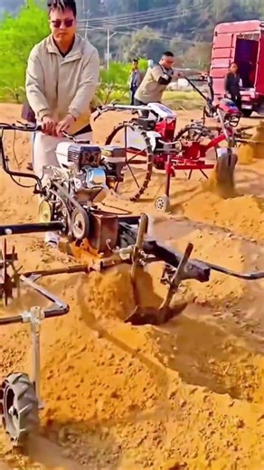 Operating a small trench digging machine to cut straight channels through sandy soil efficiently