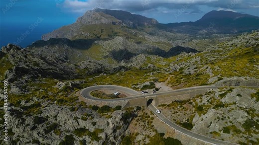 the famously serpentine Sa Calobra road in the Serra de Tramuntana mountains of Mallorca. This iconic route is a top destination for cycling, driving, and dramatic coastal views.