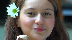 Happy Teen Girl Eating Popsicle