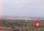 1967 – Thailand: Aerial view from aircraft cockpit of approach for landing at U-Tapao Air Base runway number 18 in Thailand
