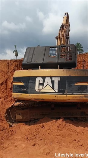 Excavator Loading a Truck: A Heavy Duty Operation