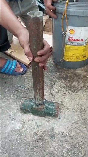 Replacing handle of sledge hammer from wood to pipe tube handle
