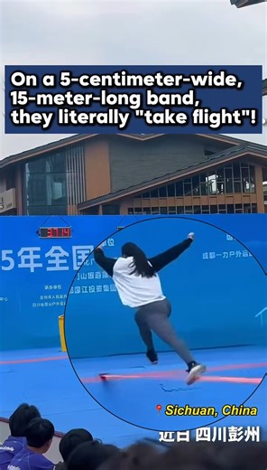 Jimu Vibes on Instagram: "On a 5-centimeter-wide, 15-meter-long band, they literally "take flight"😺 In 📍Sichuan, China, a slacklining competition was in full swing! 🎉 This athletic sport involves maintaining balance while walking on a flat band anchored between two fixed points. Originating from climbers' adaptations of tightrope walking, it is often used by rock climbers for balance training. 🤔 The sport encompasses categories such as tricklining, highlining, and speedlining, incorporating 