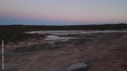 Lake Cowan at Sunset, Norseman, Western Australia – 4K Aerial Drone View of Inland Salt Lake, Calm Water, Vast Horizon, Forest, Remote Landscape and Soft Evening Sky in Australia Inland