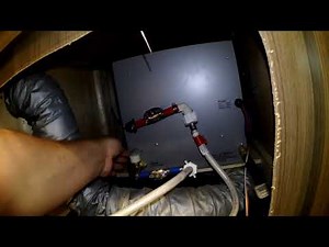 Adjusting tankless hot water heater in RV Thor Motorcoach
