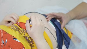 Cardiotocography of the fetus of a pregnant woman. close-up