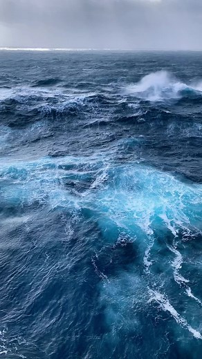 Large Ship Navigates Turbulent Ocean Waters