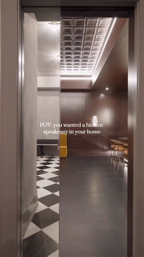 HILLSIDE HOMES | Nashville Home Builder on Instagram: "You had us at hidden bar 🍸 Based off the Rabbit Hole from Alice in Wonderland, this hidden speakeasy was crafted to reflect elegance and masculine tones from every angle. Starting with a sliding mirrored door that flows into a modern great room, you’re greeted with handcrafted lighting and custom wall detailing that screams luxury. We wanted no detail or amenity spared for this space. Simply put-it’s a room you’ll never want to leave and al