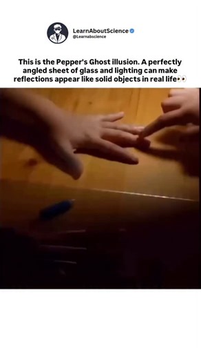 Learn About Science on Instagram: "Many assume the object appearing here is physically present. In reality, it’s an optical illusion known as Pepper’s Ghost. Source: a 19th-century illusion technique still used in theaters, museums, and live shows. • A sheet of glass is placed at a precise angle. • Hidden objects are brightly lit offstage. • Their reflection appears to float in the visible space. • Controlled lighting determines what is seen or disappears. The illusion fails if angles or lightin