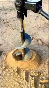 Operating a post hole digger for Yanmar