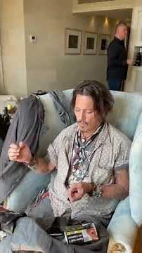 Johnny depp getting his hair done to attend bcn film festival