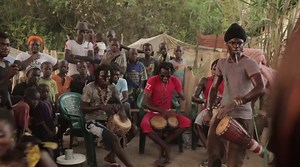 Drumming in the Casamance , Senegal. Note the interesting drums being played by the drummer in the red shirt! Drumanddanceretreat.com info@wuladrum.com | Hand Drumming Adventures And Retreats