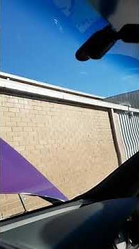 Removing rearview mirror off windscreen on VE commodore