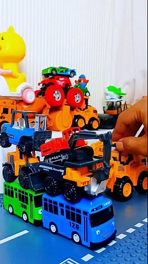 Toy car stacking game: excavator crashes into stack of tayo toy cars, loader, truck, forklift and small excavator. #toycar #reels #playful #game | Heavy Machinery Visuals
