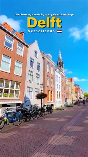 🇳🇱 Delft, Netherlands | The Charming Canal City of Royal Dutch Heritage #delft #amsterdam Delft is a charming historic city in the Netherlands, known for its picturesque canals, elegant bridges, and beautifully preserved old town. Lined with traditional Dutch houses and peaceful waterways, the city reflects the timeless character of the Dutch Golden Age. The iconic Nieuwe Kerk rises above the main square, while lively cafés and historic buildings surround the charming Markt. Famous for its blu