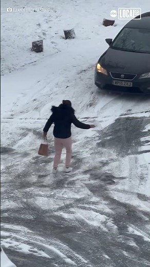 Woman hilariously slips on icy road