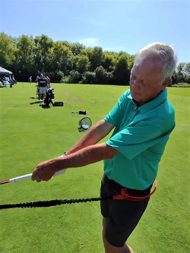 Martin Chuck on Instagram: "The @tourstrikergolf swing trainer helps so many people. Here’s a simple exercise using the Long band. If you zip the club inside, around you, you will lose tension on the band. If you take the club straight back, on a more vertical Hula-hoop, you can have better contact with the ball and turf."
