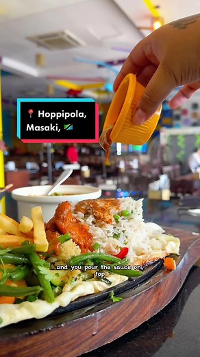 📍 Hoppipola, Masaki 🇹🇿 Im tellin y’all the butter chicken sizzler has me in a CHOKEHOLD 😮‍💨🔥 #tanzania #daressalaam #inaarabeeating #foodintanzania #foodindaressalaam #restaurantreview #restaurantvlog #indianfood #butterchicken #sizzler #paneer #dumplings #siumai #chickensizzler #grill #bbq #paneercurry #chickencurry