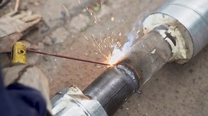 An Close Up Look at the Welding Process Featuring Sparks and Meticulous Metal Work