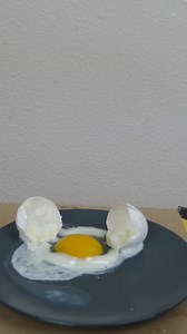 Can you cook an egg just by dropping it? 🥚 #experiment #physics #egg #heat #science #reels | The Action Lab