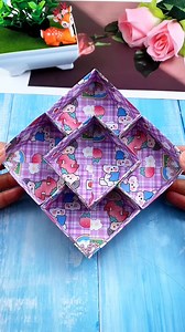 Title: Handmade Origami Organizer Hashtags: #origamicraft #handmadeorganizer #diyorganizer #papercraft #creativecrafts #foldingart #easyorigami #organizingideas #recycledcraft #craftfun #diyproject #paperfolding #origamistorage #homemadecrafts #origamifun | paper craft