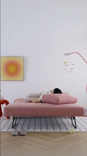 Bamton Coral Pink Armless Sofa Bed – Stylish & Space-Saving Sleeper for Small Spaces.