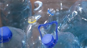 Separating Plastic Bottles for Recycling in carton Box. Waste Management - Collecting Plastic Bottles and Containers to Recycle Box. vídeo de Stock