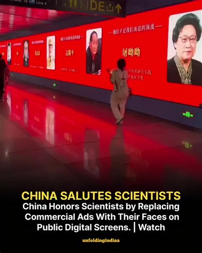 China spotlights scientists on public digital screens