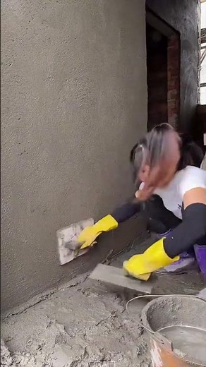 Plastering Techniques in House Renovation by a Beautiful Woman