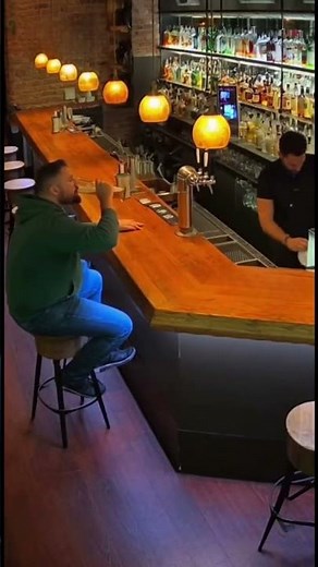 Bar camera captures barstool collapsing under customer