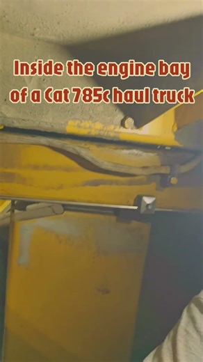 installing fire a fire suppression system inside the engine bay of a 785C haul truck.