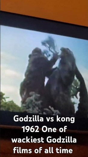 King kong shoves a the tree in godzilla's mouth godzilla vs kong 1962