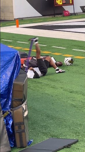 Ja’Marr Chase stretches before Tuesday practice inside Paycor Stadium