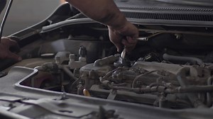 Installation of Car Engine Fuel Injector in the Repair Shop Footage.