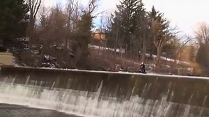 INSANE Snowmobile Dam Jump!!! | Snowmobiling Lovers