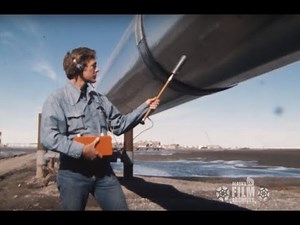 First oil flowing in trans-Alaska pipeline, June 1977