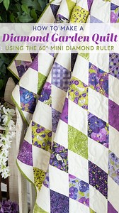 Want to bring the beauty of the garden into your home? Look no further than the Diamond Garden Quilt designed by Shabby Fabrics! Featuring the Pansy's Posies collection from Moda Fabrics United Notions, this quilt boasts vibrant prints that really pop off the white background. And guess what? Achieving those diamonds is easier than you might think thanks to the Creative Grids USA Mini 60 Degree Diamond Ruler! Follow along with Jen in the tutorial: https://www.shabbyfabrics.com/p149831 | Shabby F
