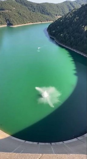 girl does a handstand and FALLS OFF a dam 😳 epic fail caught live #fail #handstand #dam