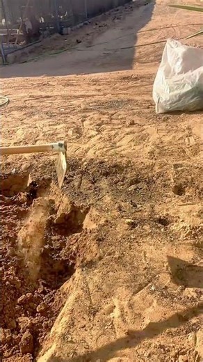 Traditional Ground Leveling Technique for Preparing Soil Foundation Borders