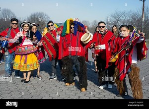 Posed group photo of Ecuadorian dancers & musicians at Flushing Meadows Corona park for a video shoot. In Queens, New York City, a very diverse place Stock Photo - Alamy