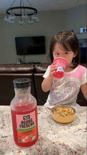 Yummy! Chloe really enjoys strawberry juice.