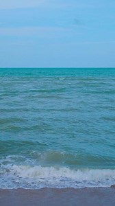 Download Vertical sea view wide beautiful nature ocean wave and blue sky background for free