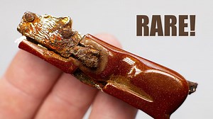 Restoring a forgotten switchblade knife with a wolf emblem