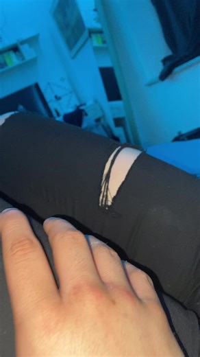 Ripped Jeans Close-Up: What's the Story Behind Them?