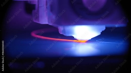 A close-up shot under deep blue lighting shows a bright white device tip scanning a surface, leaving a trail of intense orange/red, simulating thermal imaging of a heat source.